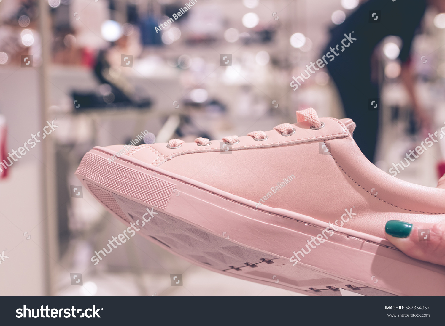 young-woman-wearing-new-shoes-shopping-stock-photo-682354957-shutterstock