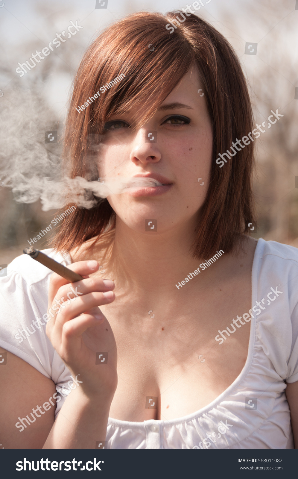 Young Woman Brown Hair Smokes Thin Stock Photo Edit Now 568011082