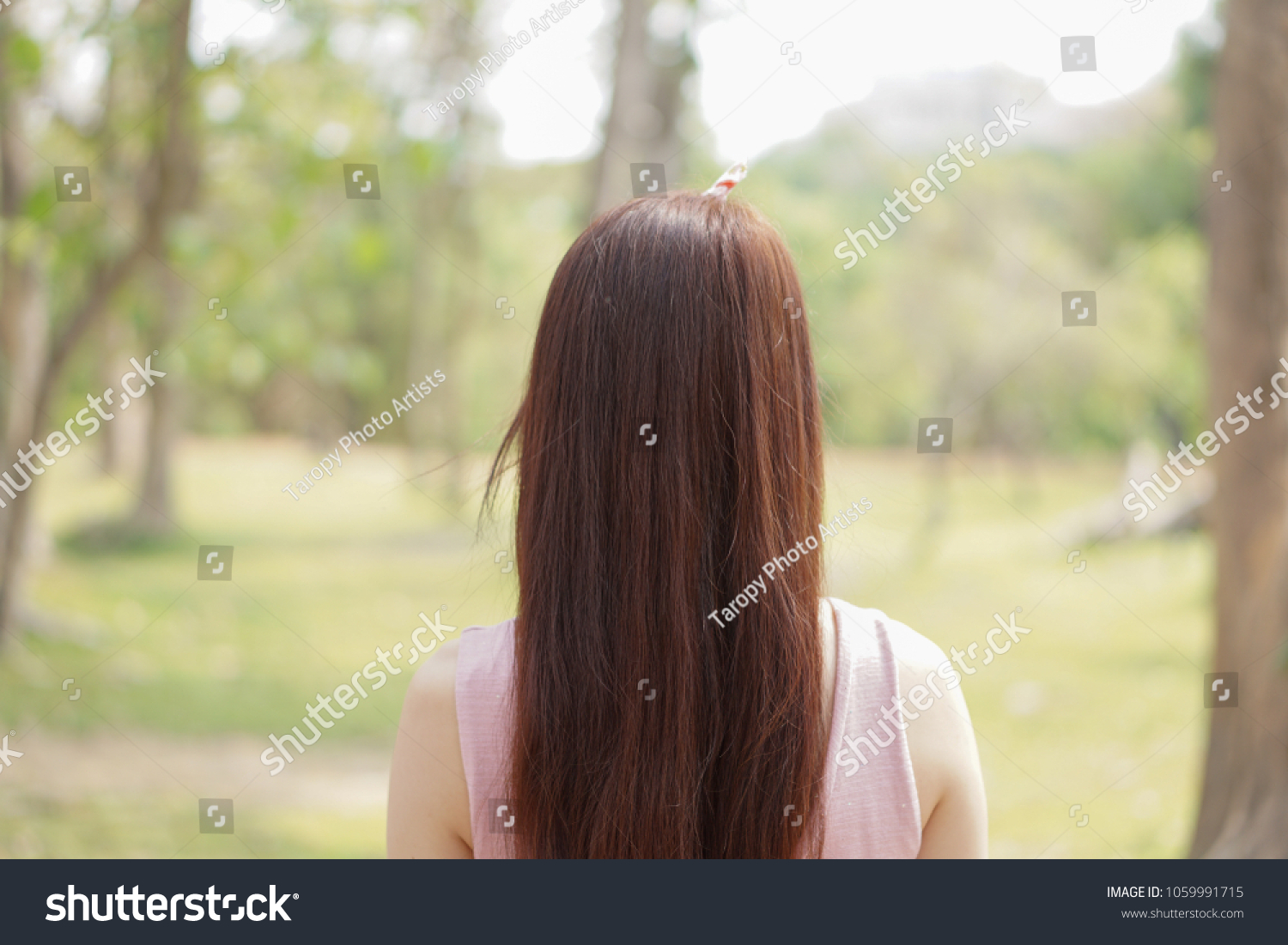 Young Woman Long Brown Hair Relaxing Stock Photo Edit Now 1059991715