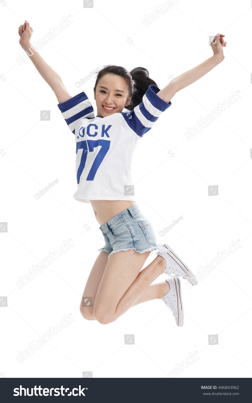 Young Women Jump Stock Photo 446843962 : Shutterstock
