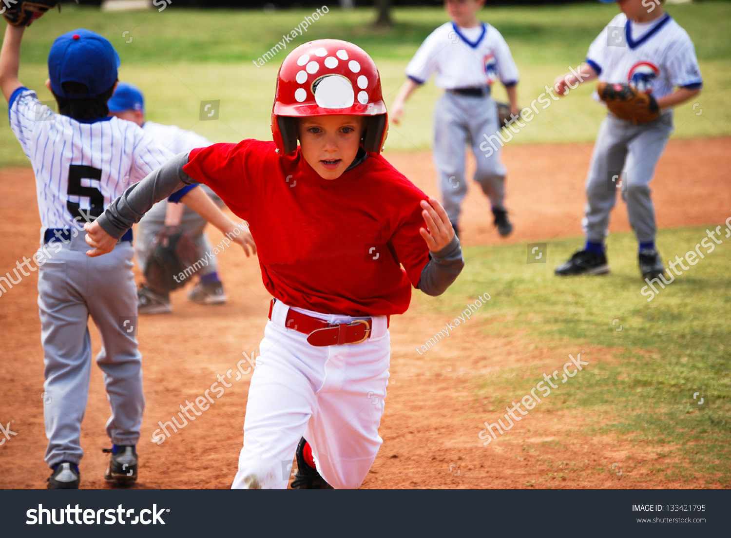 Youth Baseball Boy Running Bases. Stock Photo 133421795 : Shutterstock