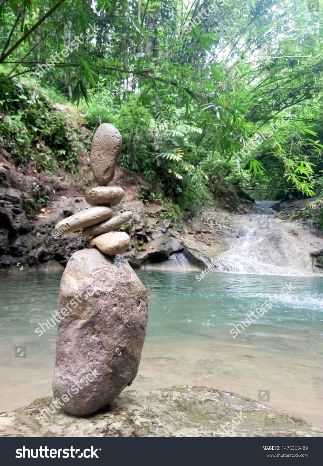 Zen Stones On River Background Blurred Stock Photo Edit Now