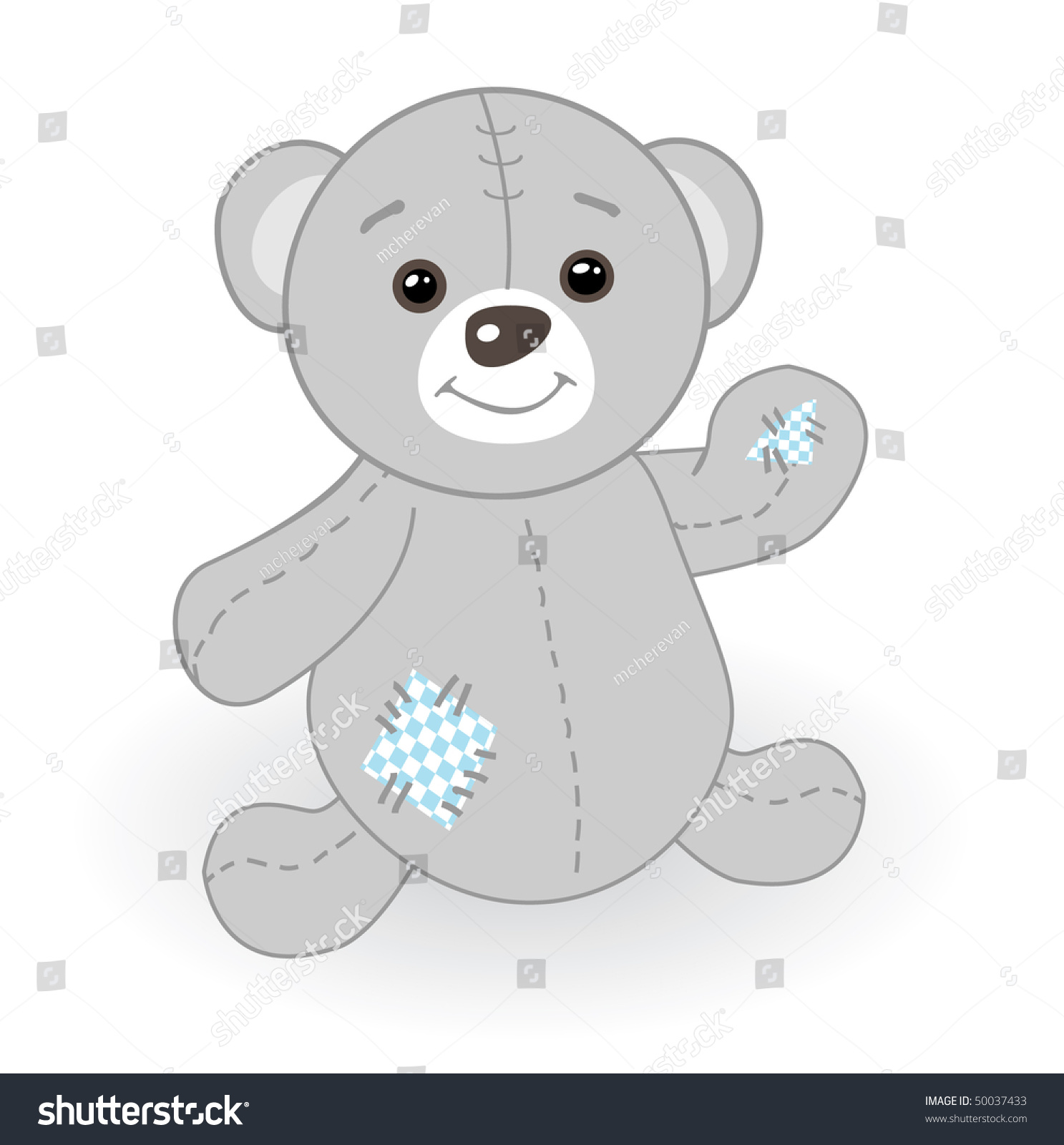 grey teddy bear with patches