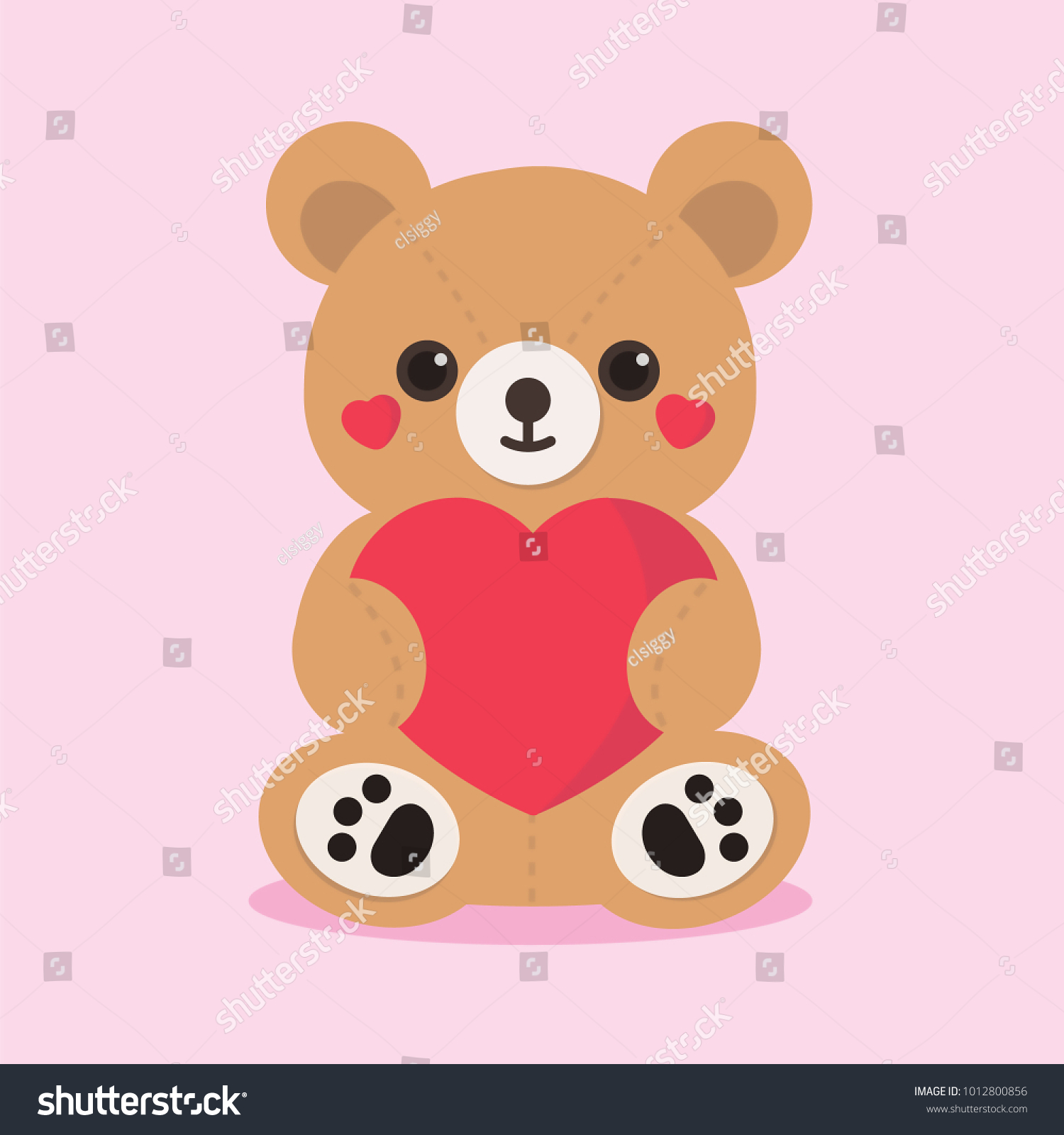 teddy holding heart