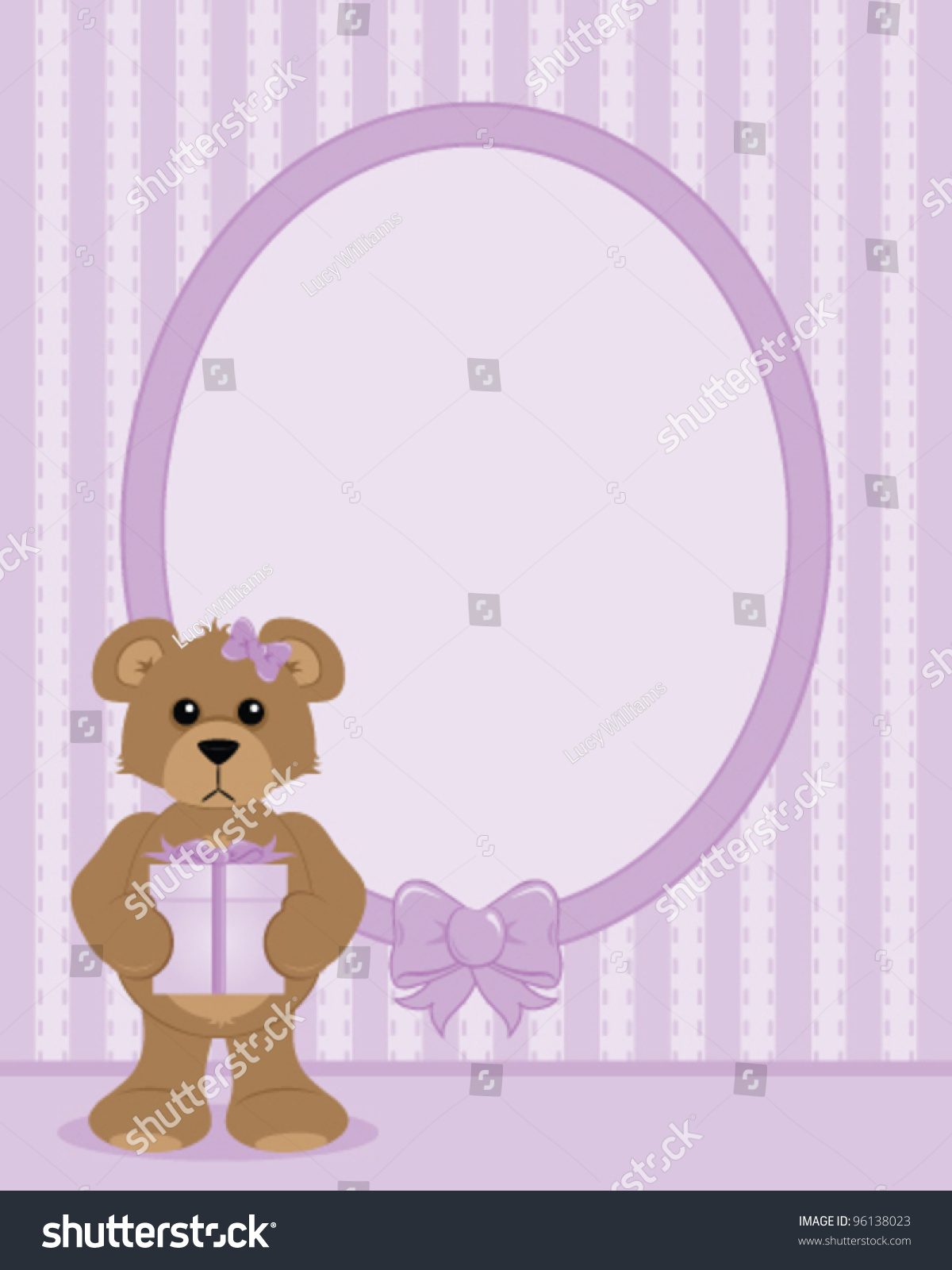 teddy bear holding picture frame